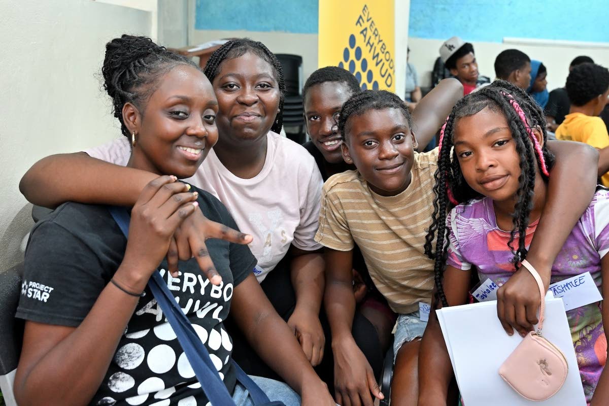 Campers share a light-hearted moment with Project STAR Community Project Officer Chanalee Wright (right) while building new friendships with peers from across Project STAR’s five communities.