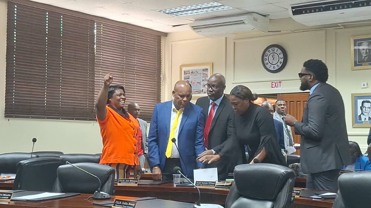 Councillor for the May Pen North division in Clarendon Tanya-Lee Williams (in black dress) being welcomed by People’s National Party councillors after switching from the Jamaica Labour Party (JLP). She announced the changed at the monthly meeting of the 