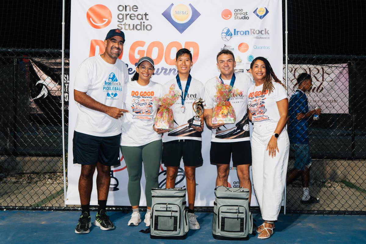 Jordan Lowe (centre) and Kyle Gregg (second right) of Elevated Renovation Limited came back from a game down to win the Class A final at the Do Good Pickleball Tourney. Sharing in the moment are (from left) Christian Watt, CEO and director of IronRock Insu