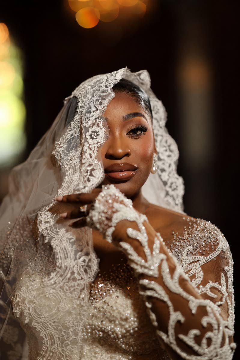 Abigail’s wedding gown, designed by Shapes by Nelson, was made in Ghana.