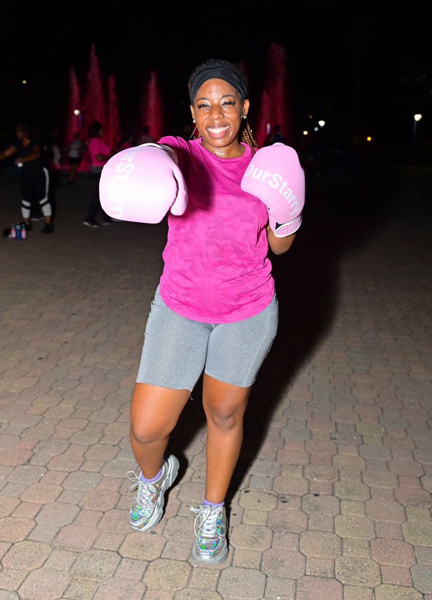 Carrie Pierre, assistant accountant at Jamaica Aggregates Ltd, puts on her pink boxing gloves and punches up her workout, all in the name of a good cause.
