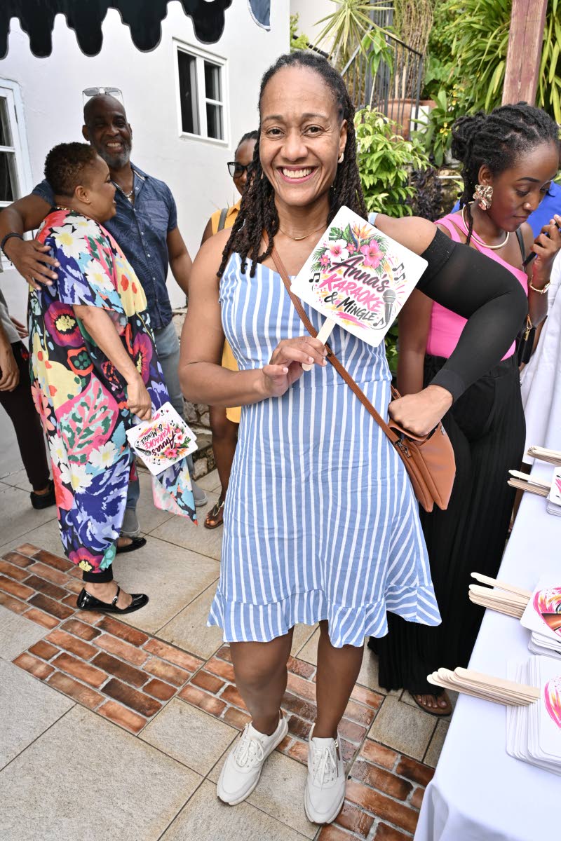 Najah Peterkin keeps it casual and comfortable in a striped summer dress.
