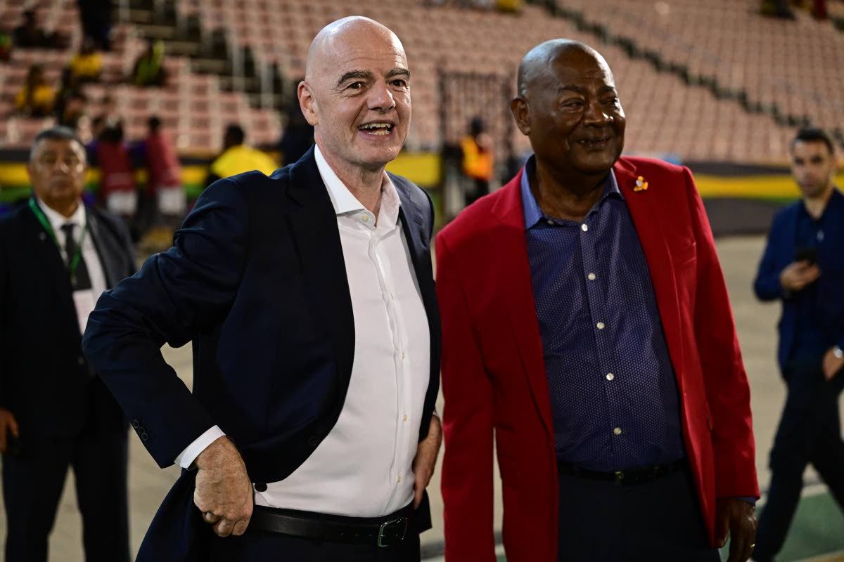 
FIFA president Gianni Infantino (left) and JFF president Michael Ricketts at the Jamaica-Guatemala Nations League football match at the National Stadium in St Andrew on Friday, September 25.