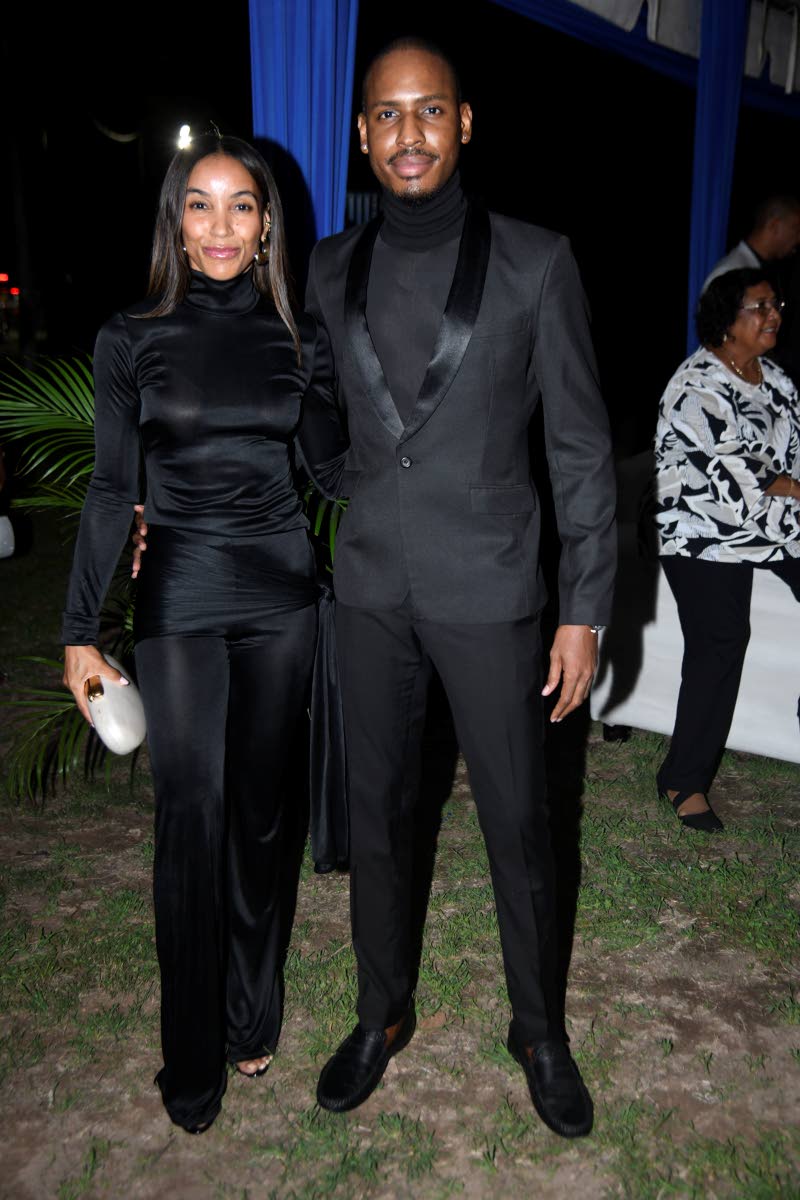 Valón Thorpe, chief executive officer of Mystique Integrated, enjoys the evening with his friend Daniella Bravo, owner of Orchid Beauty Spa.