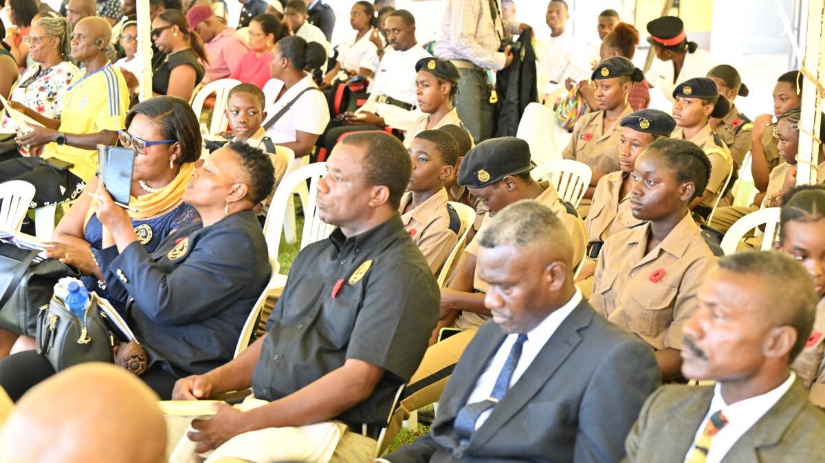 Residents of St Elizabeth attend the National Heroes Day ceremony at Black River High School.