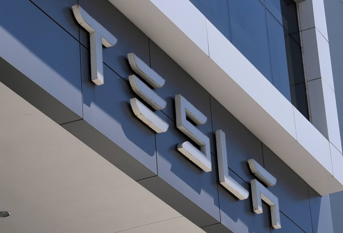 AP
The Tesla logo is displayed at a Miami dealership in March 2025. 