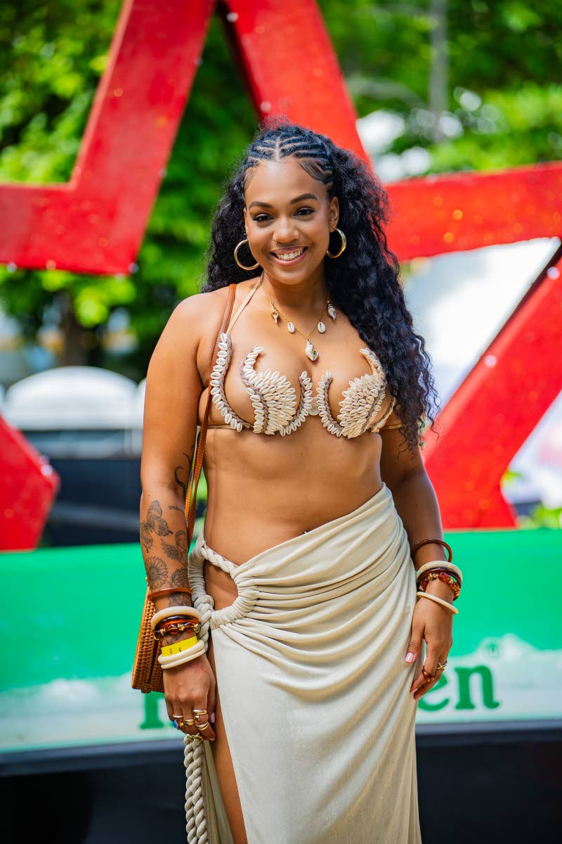 Ashley Miller, creative director and television host, dons her own design, a custom-made shell wire bra and matching maxi skirt.