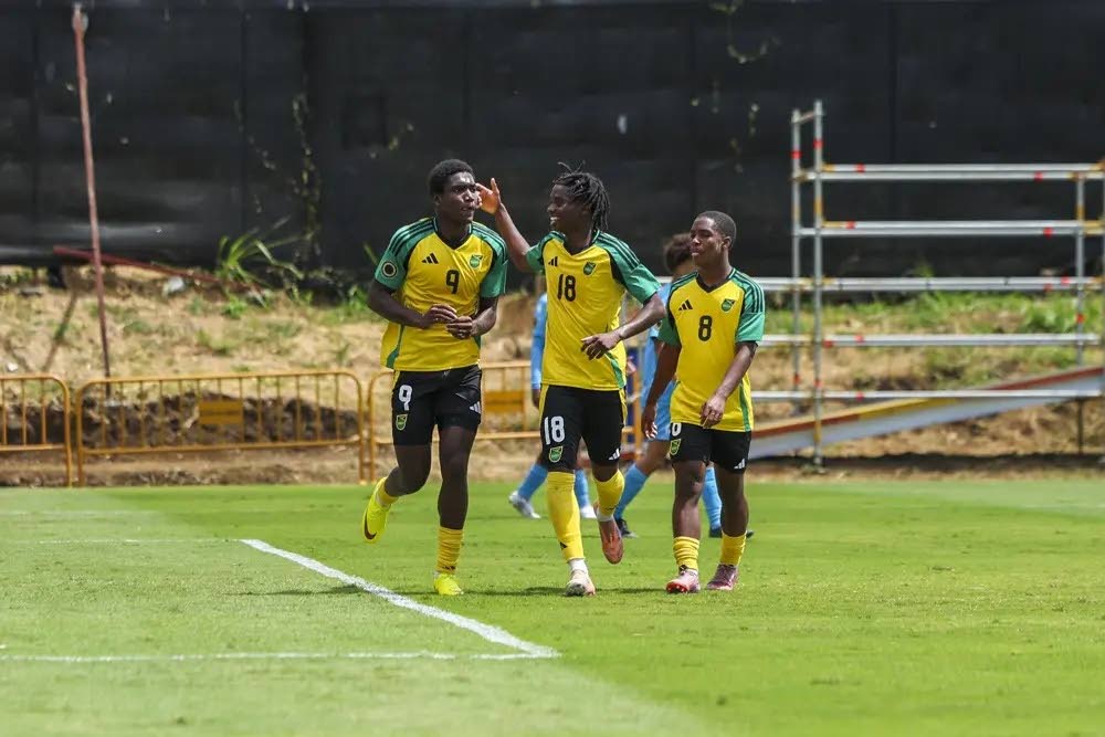 Jamaica’s Under-17 players celebrate during a World Cup Qualifier against Aruba.