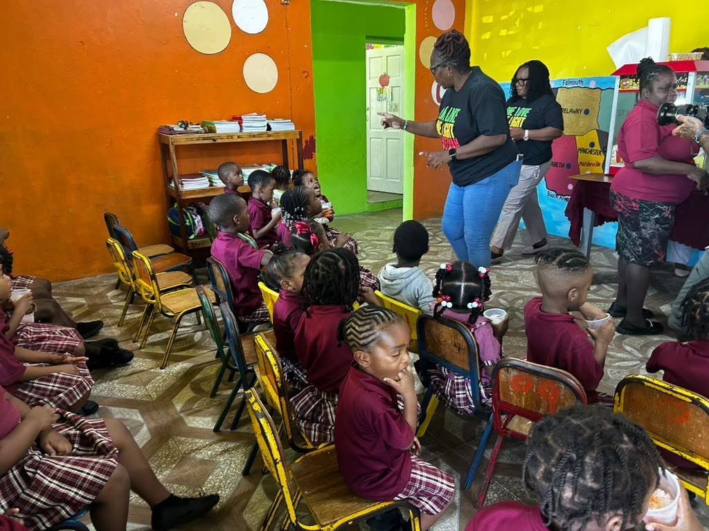 Chabad of Jamaica’s social workers interact with young residents.