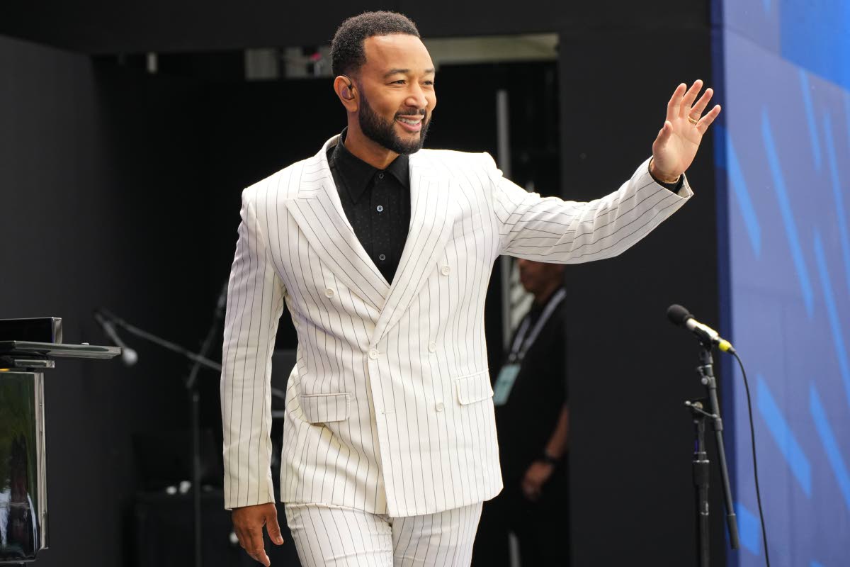 John Legend says he remains committed to challenging himself and making every album his best.