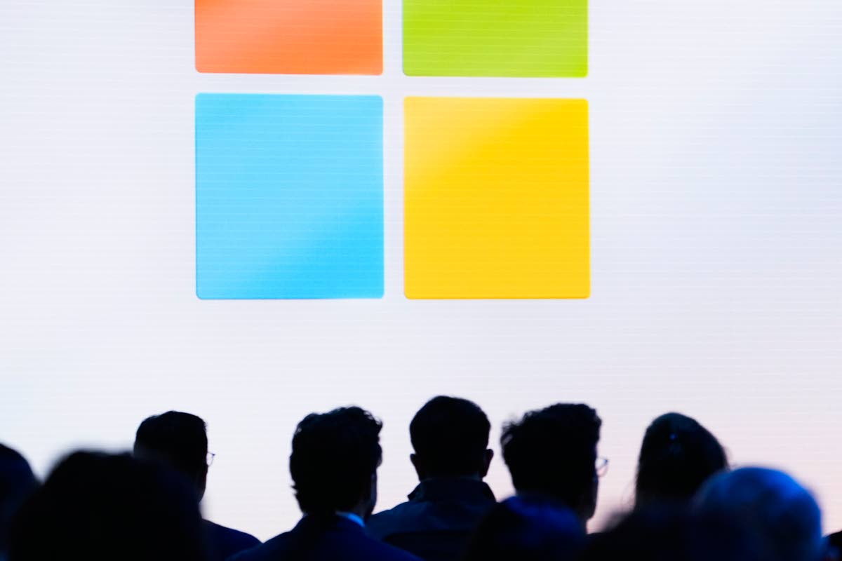 FILE - People attend a showcase event of the company’s AI assistant, Copilot, ahead of the annual Build developer conference at Microsoft headquarters, Monday, May 20, 2024, in Redmond, Wash. (AP Photo/Lindsey Wasson, File)