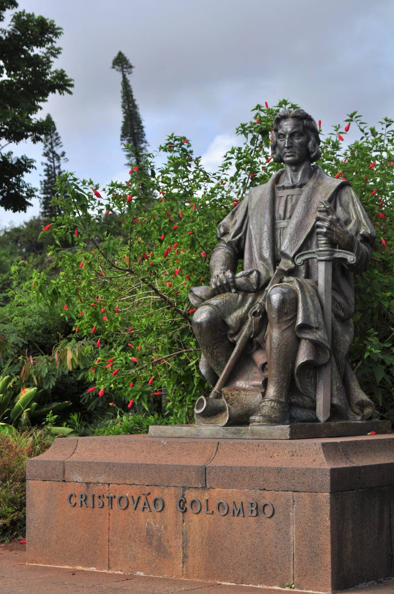 Bronze statue of Christopher Columbus in a garden in Funchal, Madeira.