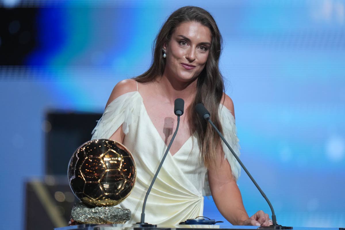 Spain’s London City Lionesses’ Alexia Putellas wins the player of the year trophy during the Ballon d’Or ceremony at the London Palladium Theatre in London, England, yesterday.