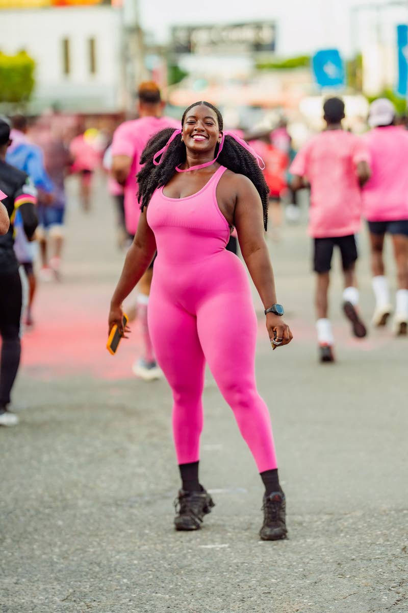 Software developer Jamelia Currie stays on theme in a pink unitard, complete with matching hair ribbons.