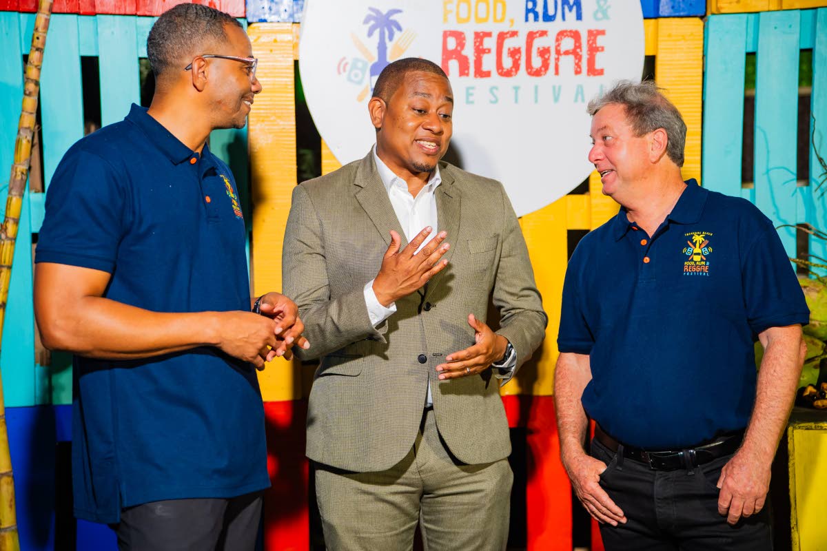 Floyd Green (centre), minister of agriculture, fisheries and mining, expresses excitement for the return of the Treasure Beach Food, Rum & Reggae Festival to St Elizabeth for the 2026 staging. Sharing his enthusiasm are festival co-directors Gregory Wright