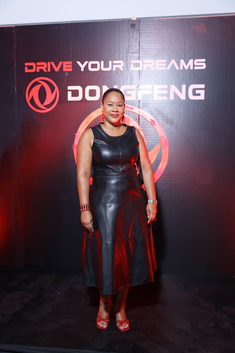 Rene Wong, senior human resource manager at Bert’s Auto Sales, opted for a classic black leather dress with red accents to match the Dongfeng brand colours.