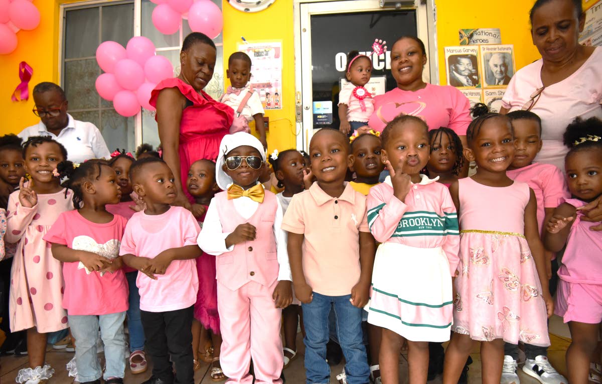 Students, teachers and parents at Gifted Minds Kindergarten, dressed in pink and gold to help raise funds to support the fight against breast cancer and childhood cancer at the Upper Elletson Road-located school on October 23. 