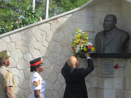Governor General Patrick Allen laying a wreath at the monument of National Hero Marcus Garvey in National Heroes Park on the occasion of Garvey’s 130th birthday in August 2017.