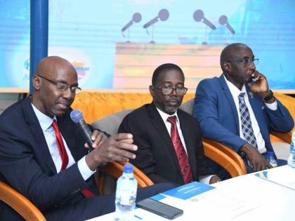 Pastor Everett Brown (left), president of the Jamaica Union Conference of Seventh-day Adventists (JAMU), gives an address to the media as Wenford Henry (centre), country director for the Adventist Development and Relief Agency Jamaica, and Adlai Blythe, tr