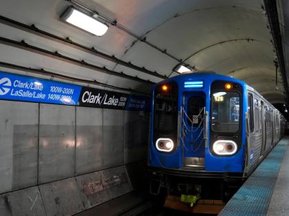 A train pulls into the Clark Street and Lake Street Blue Line stop, where a man doused a woman in liquid and set her on fire on the train in Chicago. AP 