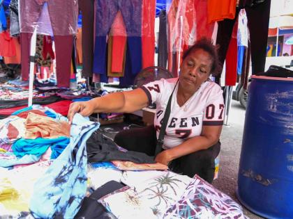 Clothing vendor Maureen Daley said she adjusted her pricing strategy to suit consumers’ limited spending power.