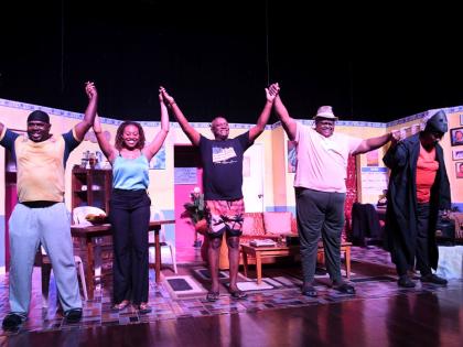 The cast of ‘Boopsie’s Homecoming’, (from left) Courtney Wilson, Renae Williams, Glen Campbell, David Crossgill, and Syprian Fuller, takes a bow at the end of a showing on December 27 at the Courtleigh Auditorium. 
