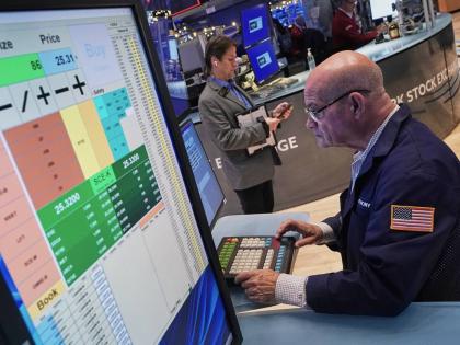 AP
Trader Anthony Confusione works on the floor of the New York Stock Exchange, Thursday, December 11, 2025.