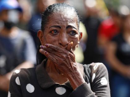 
A woman cries during a rally of supporters of Venezuelan President Nicolás Maduro in Caracas, Venezuela, on Saturday.