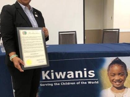 Incoming President, Kiwanis International, Hope Markes, poses with the Proclamation declaring the ‘Hope Markes Day’ in Lauderhill, Florida. 