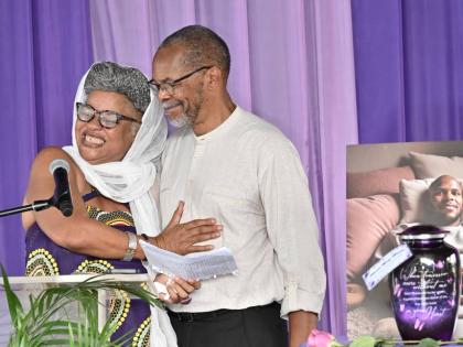 Bridgett Anderson and Ricardo Munoz Bennett, parents of Ricardo Anthony Munoz Bennett speaks at the thanksgiving service for their son, Ricardo Anthony Munoz-Bennett, at Louise Bennett Garden Theatre on Hope Road in Kingston on Wednesday.