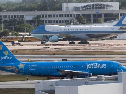 A JetBlue passenger jet, front, taxis at Palm Beach International Airport, Sunday, March 30, 2025, in West Palm Beach, Fla. (AP Photo/Manuel Balce Ceneta, File)