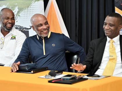 From left: Calbert Hutchinson, president of Jamaica Lacrosse; Christopher Samuda, president of JOA; and Dr. Asburn Pinnock, president of Mico University College, speak at the Jamaica Lacrosse press conference at the Mico University College in Kingston yest
