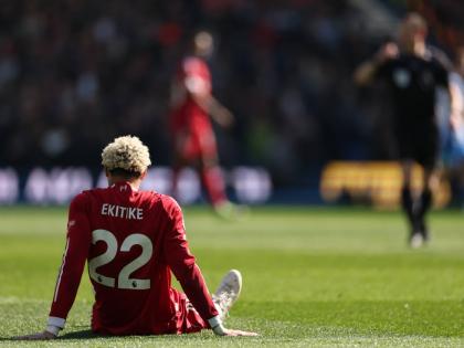 AP 
Liverpool’s Hugo Ekitike sits injured during the English Premier League football match against Brighton in Brighton yesterday.