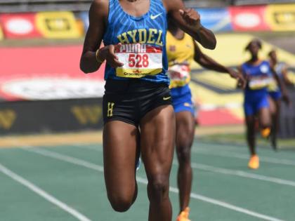 Hydel’s Nastassia Fletcher wins her race in the Girls’ Class One 400m at Champs 2026.