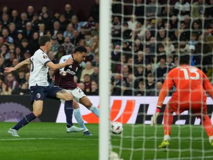 Aston Villa’s Morgan Rogers scores his side’s third goal during the Europa League quarter-final second leg match between Aston Villa and Bologna, in Birmingham, England, yesterday.