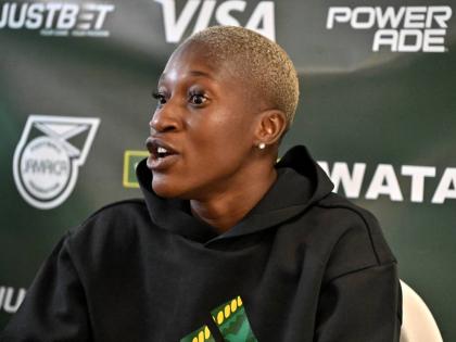 Deneisha Blackwood speaks to the media during the Reggae Girlz press conference at the National Stadium yesterday.
