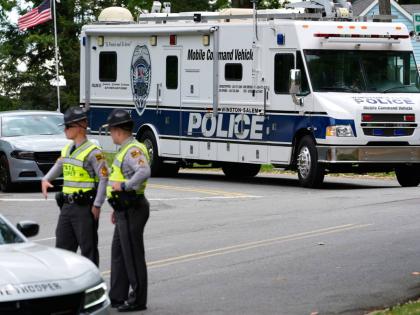 A police mobile command vehicle leaves the the scene of a shooting at Leinbach Park on Monday, April 20, 2026, in Winston-Salem, N.C. (AP Photo/Erik Verduzco)