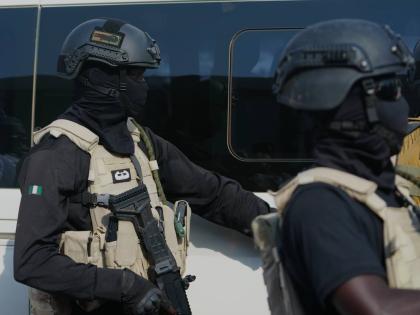 Members of the Nigerian army provide security during an event in Minna, Nigeria, December 22, 2025. (AP Photo/Sunday Alamba, File)
