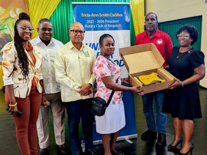 The Rotary Club of Kingston recently presented  an automated external  defibrillator (AED) to the Excelsior College.  From left are: Carolyn Gardner, president-elect, Rotary  Club of Kingston; Karsten Johnson, Assistant Governor, Rotary District 7020; Will