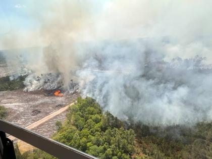 The photo provided by the Office of Governor Brian Kemp shows smoke produced from a wildfire in Brantley County, Georgia, on Friday.
