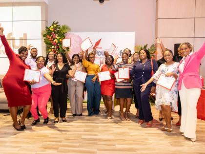 The JMMB SME Resource Centre team pose for a photo with Cohort 3 graduates of the SME PowHERful Women in Business Programme.