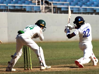 Barbados Pride’s Jonathan Drakes is stumped for 94 by wicketkeeper Romaine Morris of the Jamaica Scorpions on the opening day of their West Indies Championship match at Sabina Park yesterday.