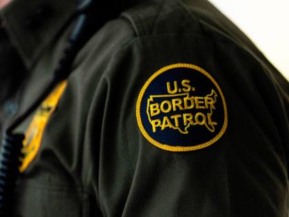 A US Border Patrol badge is displayed as Gregory Bovino, chief patrol agent of the US Border Patrol's El Centro Sector, stands in a conference room before an interview with The Associated Press in Los Angeles, August 25, 2025. (AP Photo/Jae C. Hong, File)