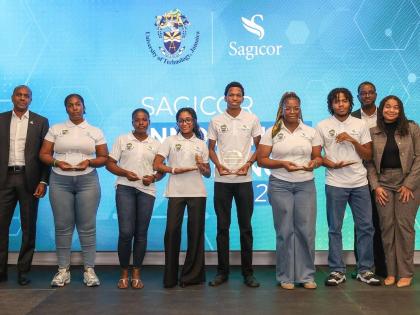 Organisers of the Sagicor-UTech, Ja Innovation Challenge pose with the winning teams following the cheque presentation at the AC Marriott Hotel in Kingston on Tuesday, April 21. From left are Andrew Burke, vice-president of innovation and data at Sagicor G
