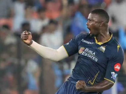 Jason Holder celebrates a wicket for the Gujarat Titans. 