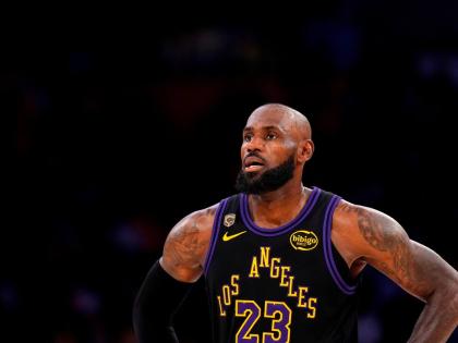 FILE - Los Angeles Lakers forward LeBron James stands on the court in the closing minutes of Game 4 in a second-round NBA basketball playoffs series against the Oklahoma City Thunder, May 11, 2026, in Los Angeles. (AP Photo/Mark J. Terrill, File)