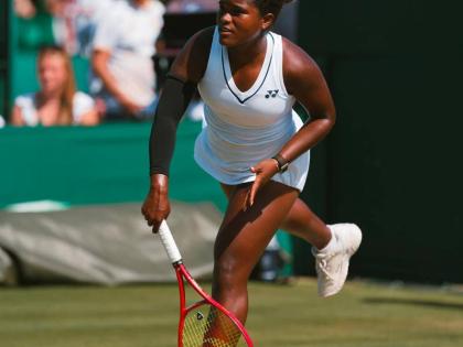 Alyssa James in action at Wimbledon.