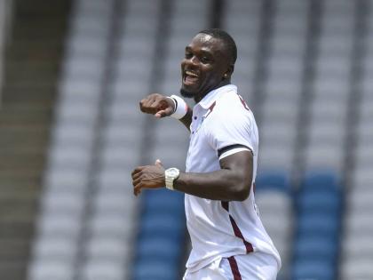 West Indies paceman Jayden Seales celebrates one of his five wickets during yesterday’s Test match against Pakistan at the Brian Lara Cricket Academy in Tarouba, Trinidad.