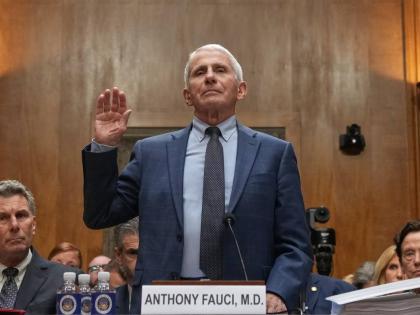 Dr Anthony Fauci is sworn in before the Senate Homeland Security and Governmental Affairs Committee at the Capitol, Wednesday, in Washington.