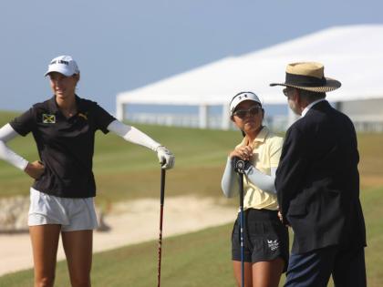 
Jamaica’s Mattea Issa looks a relaxed figure just before the opening tee-off at the CAC Games in Punta Cana, Dominican Republic. Looking on is Maria Lopez of Panama.